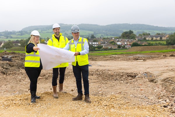 Amanda Swann, Gregg Hodgetts and Simon Kershaw look over the plans for the new homes in Winchcombe
