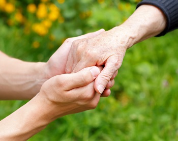 Dementia holding hands