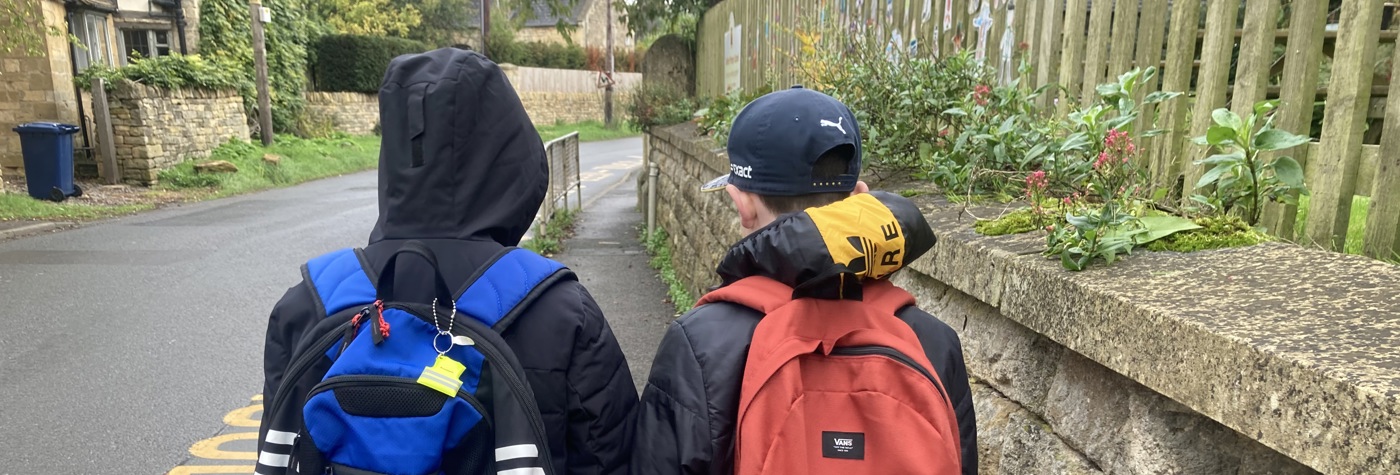 Two Children Walking To School