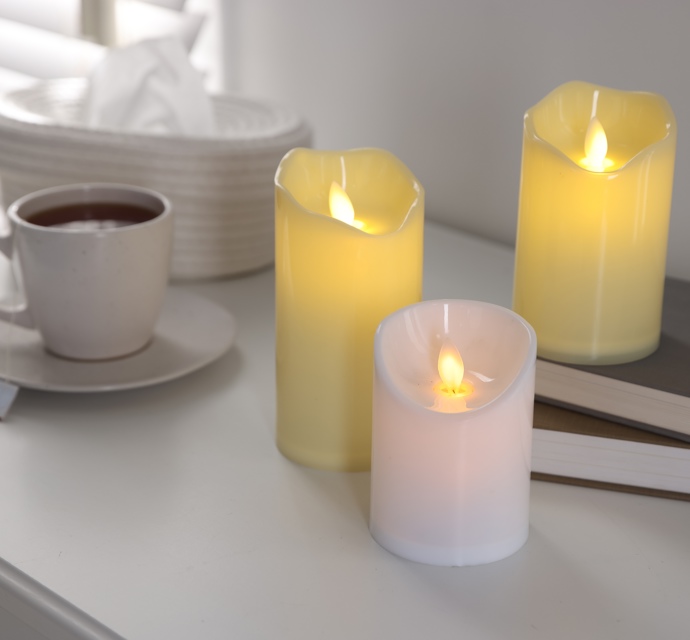 Decorative Led Candles Tea Books And Tissues On 2026 01 11 10 58 51 Utc