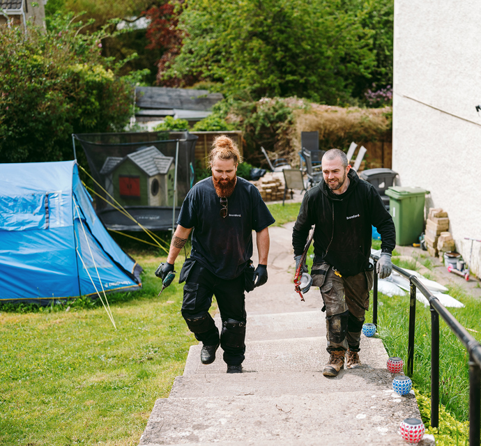 Two bromford colleagues working outside
