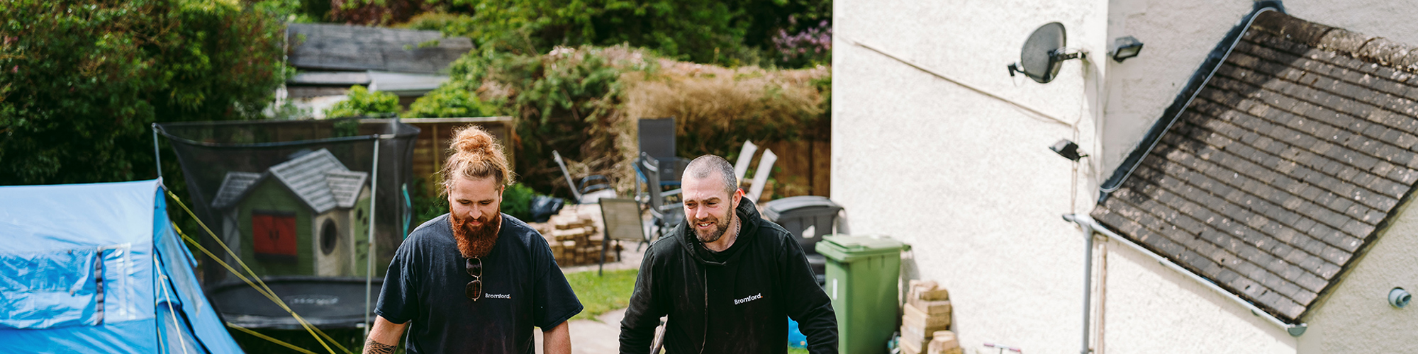 Two bromford colleagues working outside