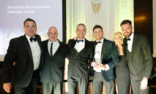 Colleagues from BDL celebrate after winning at the Homebuilder Safety Awards