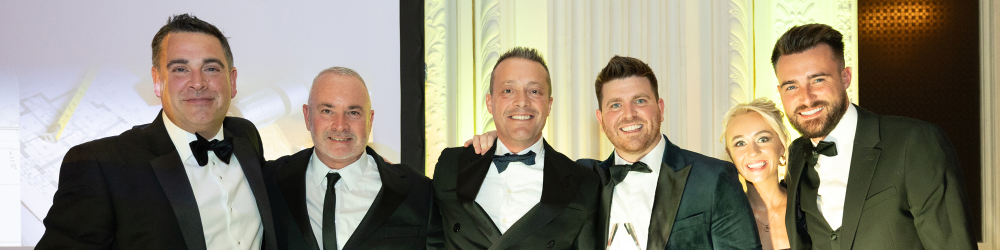 Colleagues from BDL celebrate after winning at the Homebuilder Safety Awards