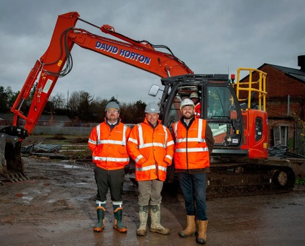 From left, Bromford senior quantity surveyor Karl Ogden, construction manager James Atkinson, and senior pre-contract manager Adam Crompton, at Great Western Yard, where former railway buildings are making way for 113 new Bromford homes, part of 315 total on the site (Credit: Becky Randall, Pixel PR Photo)