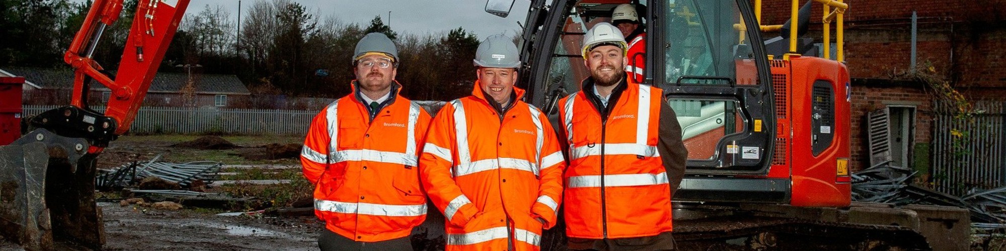 From left, Bromford senior quantity surveyor Karl Ogden, construction manager James Atkinson, and senior pre-contract manager Adam Crompton, at Great Western Yard, where former railway buildings are making way for 113 new Bromford homes, part of 315 total on the site (Credit: Becky Randall, Pixel PR Photo)