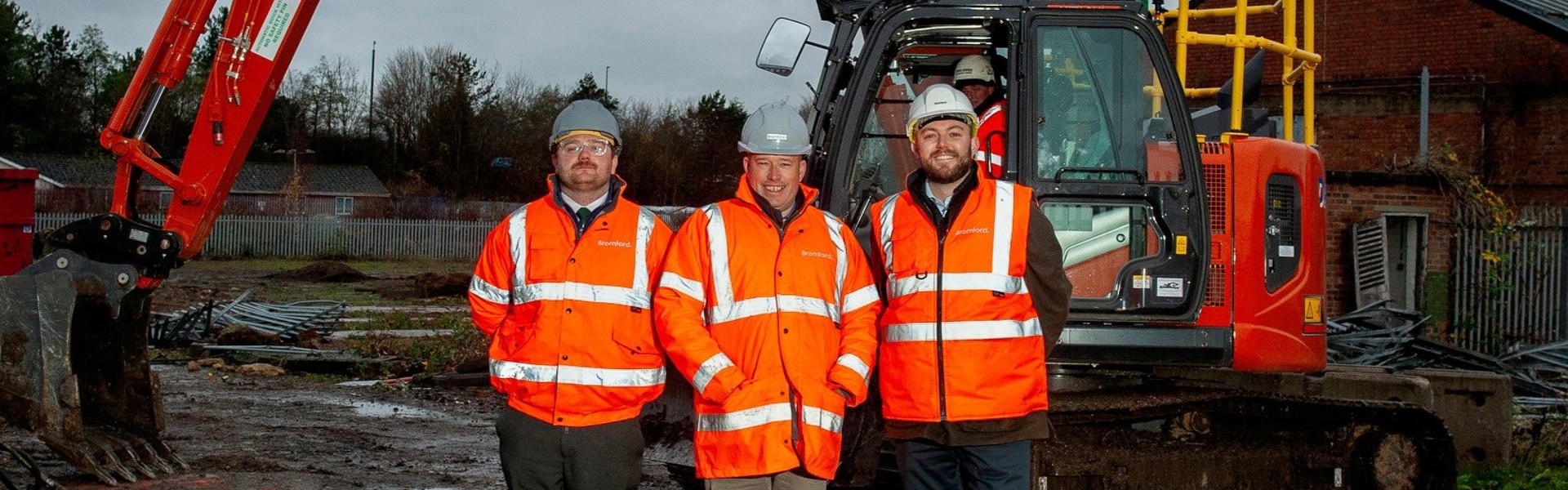 From left, Bromford senior quantity surveyor Karl Ogden, construction manager James Atkinson, and senior pre-contract manager Adam Crompton, at Great Western Yard, where former railway buildings are making way for 113 new Bromford homes, part of 315 total on the site (Credit: Becky Randall, Pixel PR Photo)