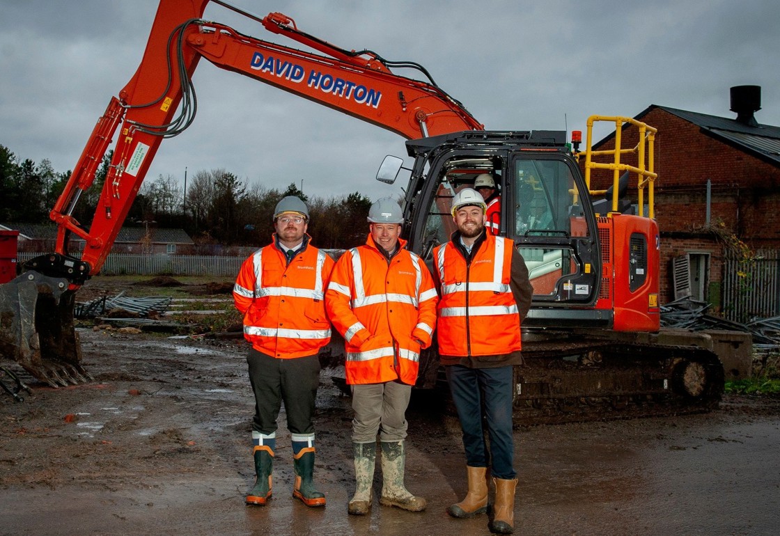 From left, Bromford senior quantity surveyor Karl Ogden, construction manager James Atkinson, and senior pre-contract manager Adam Crompton, at Great Western Yard, where former railway buildings are making way for 113 new Bromford homes, part of 315 total on the site (Credit: Becky Randall, Pixel PR Photo)