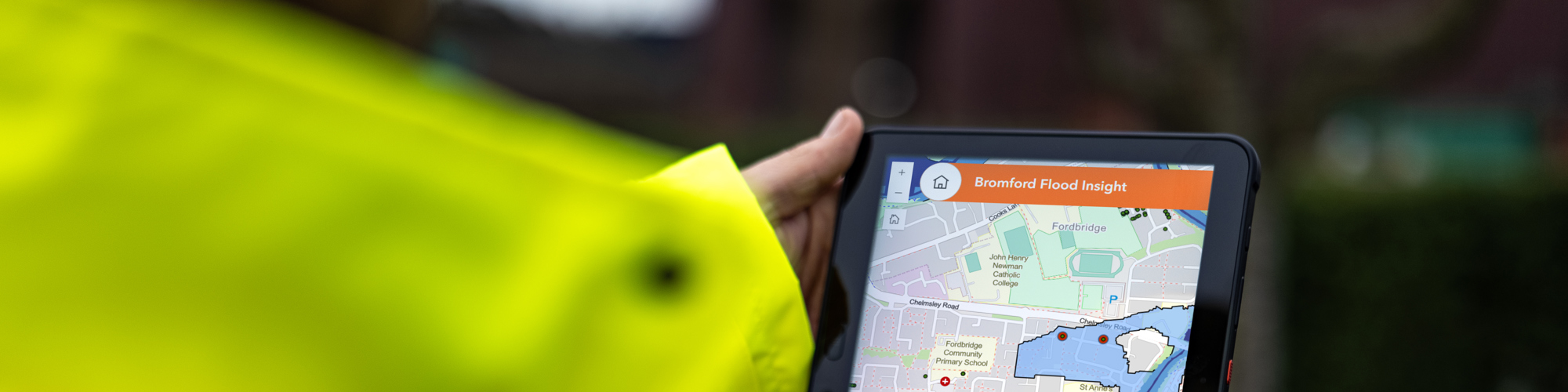 Image of a Bromford colleague using the Bromford Flood Insight app