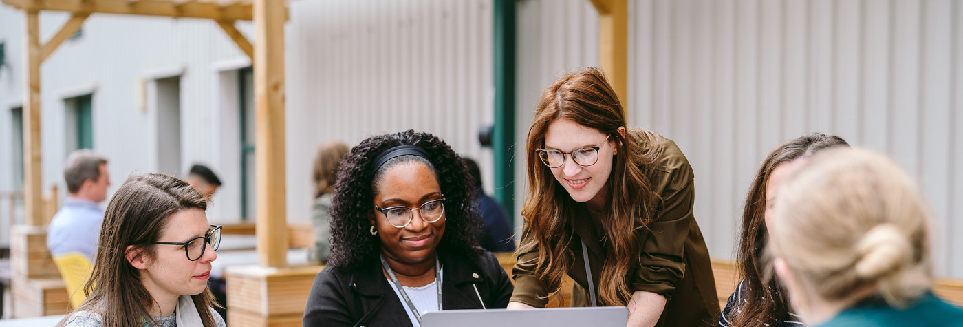 Female Colleagues Around A Table