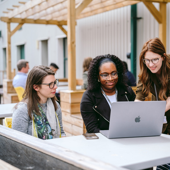 Female Colleagues Around A Table