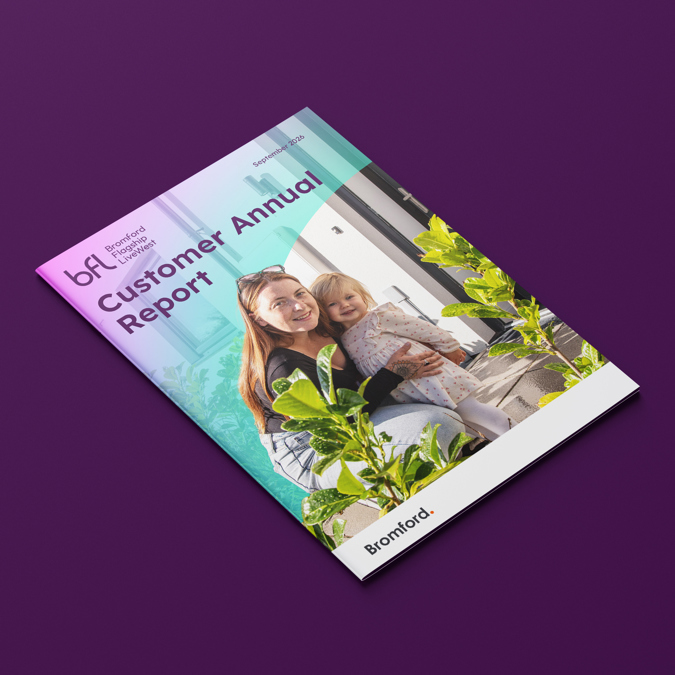 A prospective 3D print document mockup titled "Customer Annual Report" dated September 2026, set against a dark purple backdrop. The cover features a photo of a woman holding a young child in an outdoor setting, with branding for "bfl" (Bromford, Flagship, LiveWest) at the top left and the Bromford logo at the bottom right corner.