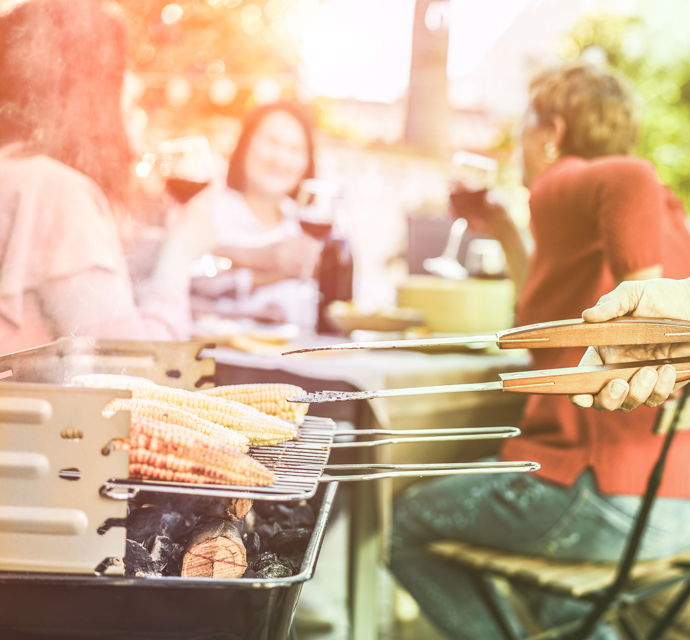 Trendy Man Cooking Cobs Of The Corn At Vegetarian 2026 03 26 04 02 06 Utc